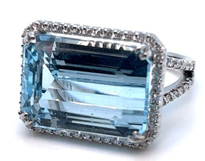 18W 20.50ct Emerald Cut Blue Topaz and Halo Diamond Ring sz 6