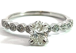 14W Oval Center in Rd Bezel Diamond Ring sz6 6.5x4.9m .67ct I/SI2