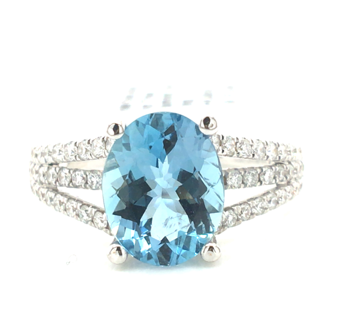 18W Oval Aqua and Three Diamond Shank Ring