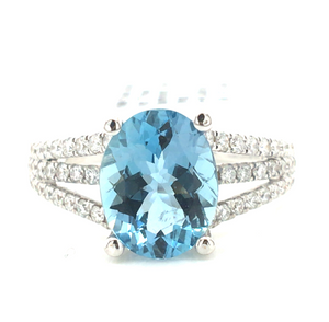 18W Oval Aqua and Three Diamond Shank Ring