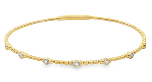 14Y .24ctw 7 Stone Beaded Bangle with Round Milgrained Diamond Accents