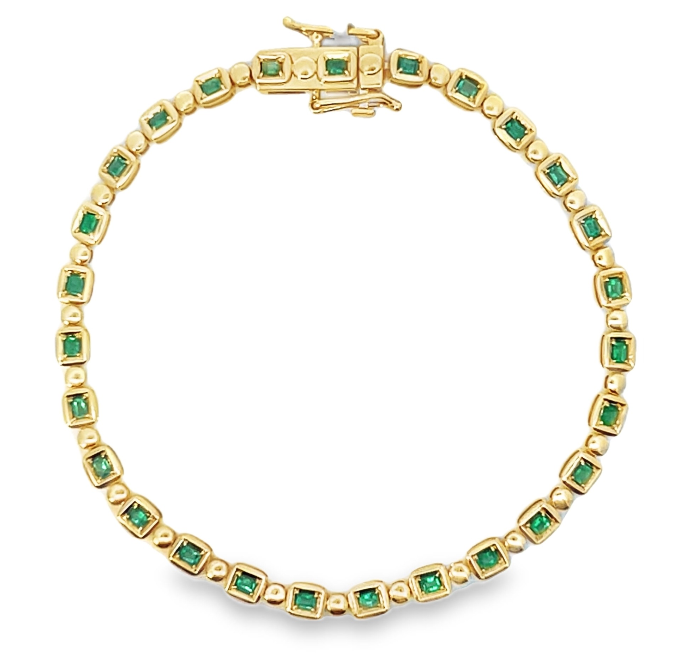 14Y Alternating Cushion Shaped Bezels with Round Emeralds and Round Solid Section Bracelet