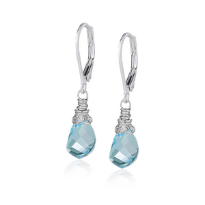 faceted blue topaz twist earrings in silver