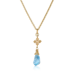 faceted blue topaz twist necklace with flower detail in gold